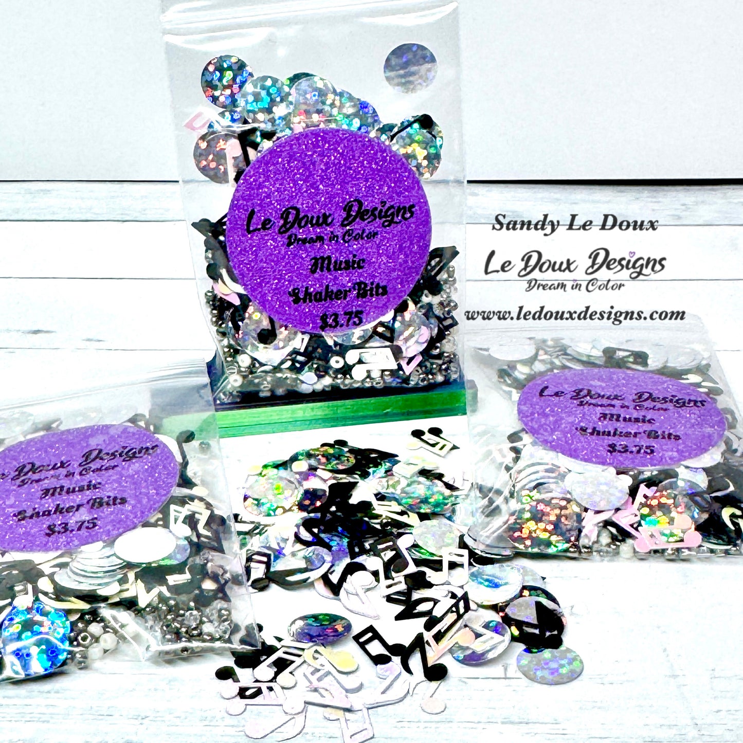 Music-themed sequin bits packaging with 'Le Doux Designs' branding on a white background.