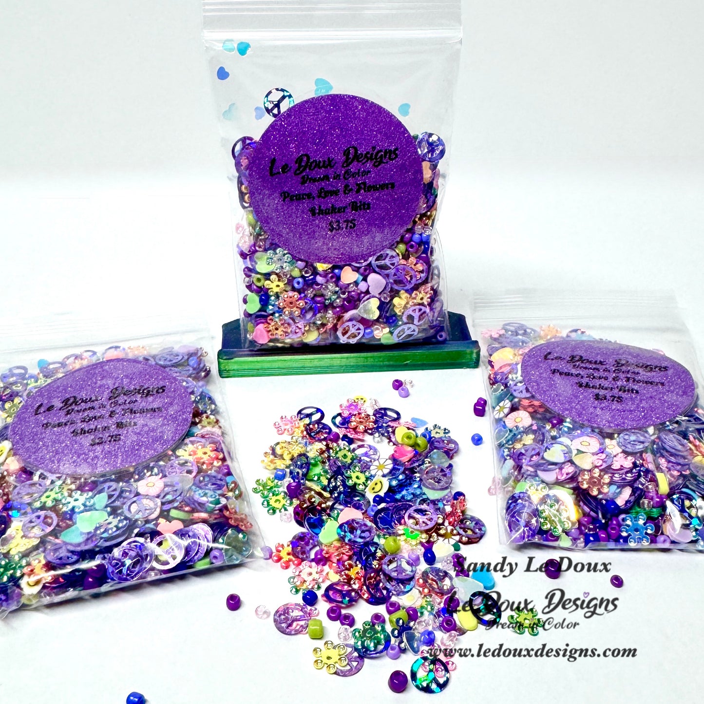 Colorful sequin and embellishment kit with 'Le Doux Designs' branding on a white background.