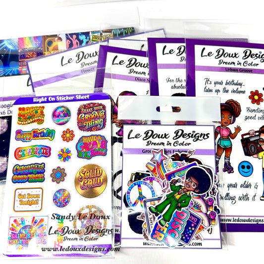 Collection of Le Doux Designs sticker sheets and packaging on a white background